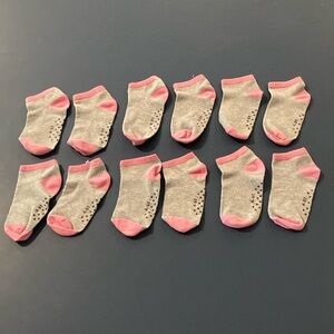 Girls socks 4 to 5T. EUC. Has some wear from washing and wearing. 6 pairs.